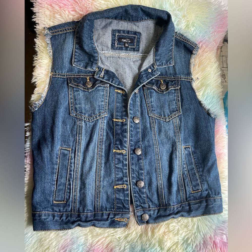 Jean vest, black lace on back.